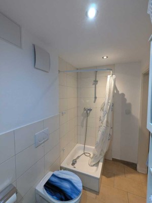 Geschmackvolle 1-Zimmer-Souterrain-Wohnung mit Terrasse und EBK in Meckenheim-Merl