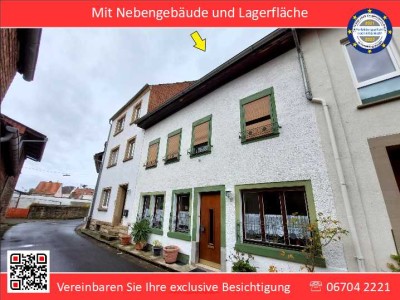 Einfamilienhaus mit Nebengebäude im Zentrum