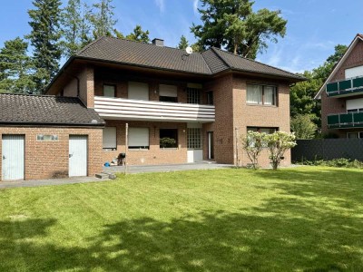 Geräumige Erdgeschosswohnung mit Garten und Garage in Sandkrug.
