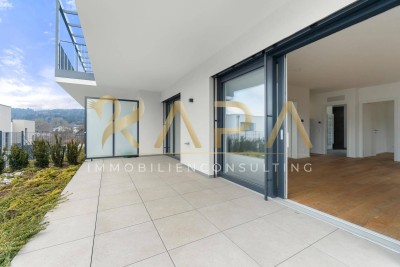 Erstbezug Terrassenwohnung mit seitlichem Seeblick und kleinem Eigengarten!