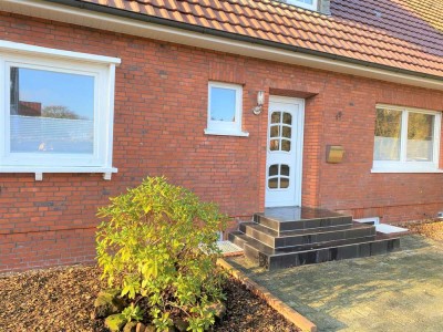 Erdgeschosswohnung mit Kamin, Terrasse und Garten!