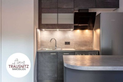 Nahezu Neubau: Stilvolle Erdgeschosswohnung mit sonniger Terrasse