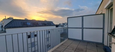 Helle Dachgeschosswohnung mit Sonnenterrasse inklusive Tiefgaragenplatz
