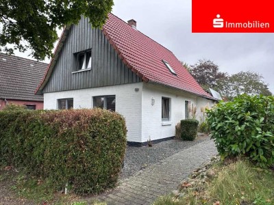 Charmantes Einfamilienhaus mit hellem Wintergarten und Dachterrasse