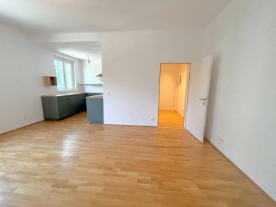 Perfekt aufgeteilte 2-Zimmer Wohnung mit offener, möblierter Küche!