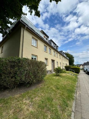 Schöne Erdgeschosswohnung mit Balkon in historischer Wohnsiedlung