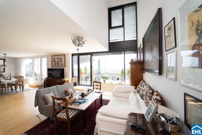 Lichtdurchfluteten Dachgeschoß-Maisonettewohnung mit traumhafter Terrasse und Grünblick!