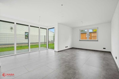 Neubau-Erstbezug: 3,5  Zimmer Nord-/Westwohnung mit Terrasse und Gartenanteil!