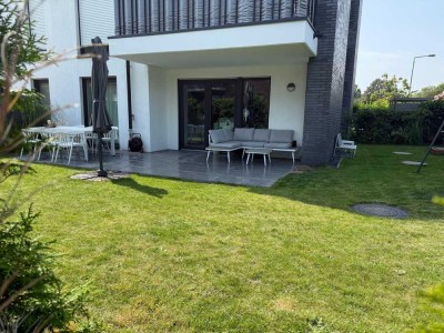 Moderne 3-Zimmer-Erdgeschosswohnung mit Terrasse und Garten