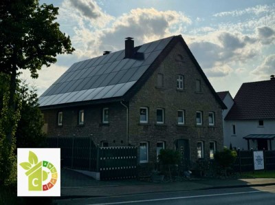 energetisches Bruchsteinhaus mit Schwimmteich