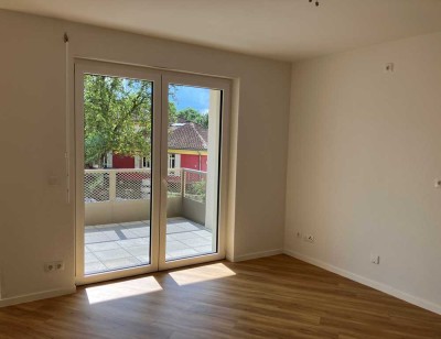 Öffentlich geförderte Drei-Zimmer-Neubauwohnung mit Balkon