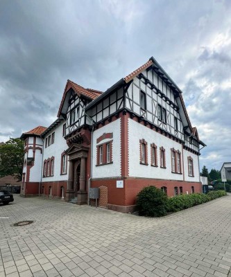 Moderne Souterrainwohnung mit Terrasse im denkmalgeschützten Gebäude zu verkaufen!