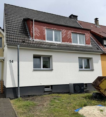 Modernisierte Doppelhaushälfte in Hamm – Effizienzhaus 85 EE, zwei Wohneinheiten