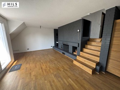 Modernes Wohnen mit außergewöhnlicher Architektur. Split-Level-Wohnung mit 2 Balkonen in Unterbilk