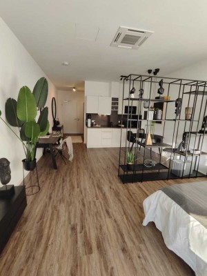 Modernes Designer-Studio-Apartment mit Klimaanlage und 24/7-Fitnessraum