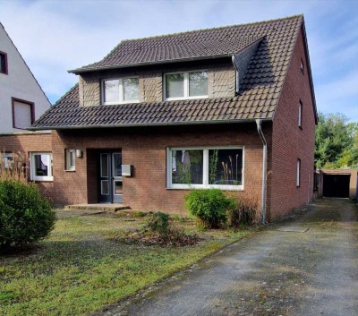 Freistehendes Einfamilienhaus mit großem Garten und Garage in Gronau!