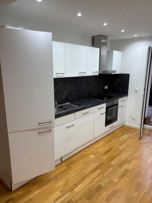 Schöne, sanierte 2-Zimmer Wohnung mit großer Terrasse und Einbauküche inkl. Stellplatz