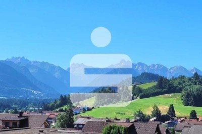 Familientraum mit Panoramablick: Terrassenhaus mit Einliegerwohnung in Fischen-Berg