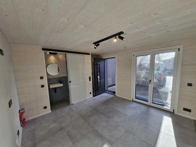 Erstbezug: Charmantes Tiny-Apartment mit Terrasse und großem Garten zur Mitnutzung