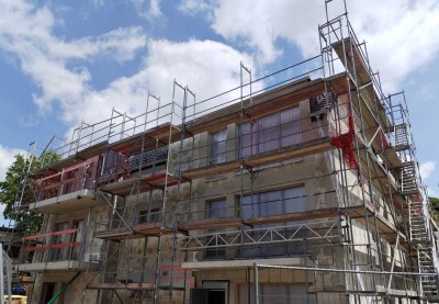Neubau-Erstbezug: Stilvolle 3-Raum-Wohnung mit Garten, TG & ansprechender Ausstattung