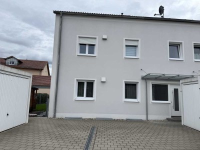 Wohnung im EG/UG mit exklusiver Küche, Terrasse, Garten und Garage