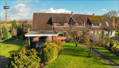 Charmante Doppelhaushälfte in besonderer Feldrandlage mit Garage und Carport