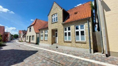 Charmantes Einfamilienhaus mit großem Garten und historischem Flair in zentraler Stadtlage