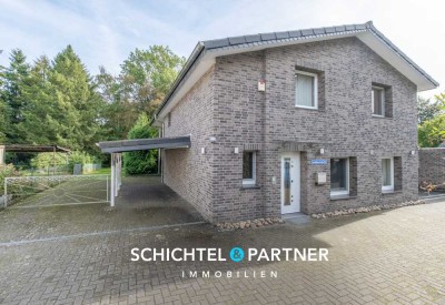 Ritterhude | Modernisiertes Einfamilienhaus mit Balkon, Terrasse und zwei Garagen in begehrter Lage