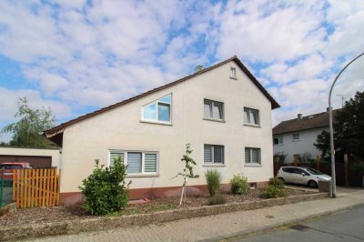 Einziehen und wohlfühlen: Charmantes Einfamilienhaus mit großem Garten, Terrasse und Garage