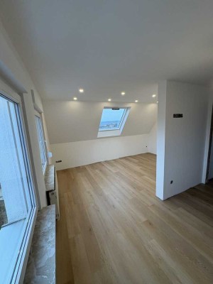 Erstbezug - moderne 3,5-Zimmer-Wohnung mit Balkon, Garten & Traum-Aussicht
