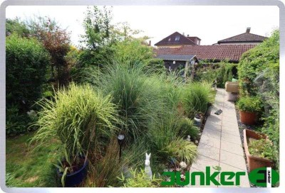 ***Eigentumswohnung mit Garten und Garage***