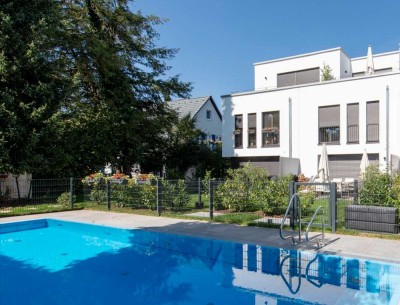 Exklusives Reiheneckhaus mit einmaligem Pool