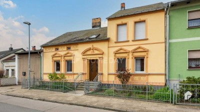 Charmantes Reihenendhaus mit großzügigem Grundstück