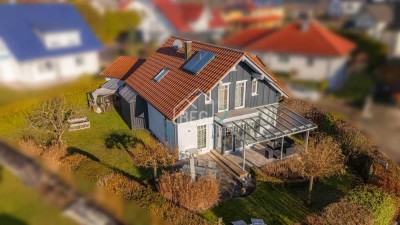 Familienfreundliches Einfamilienhaus 
mit Garten, Terrasse und Doppelgarage
