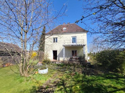 Einfamilienhaus mit Traumgarten in Stadtlage