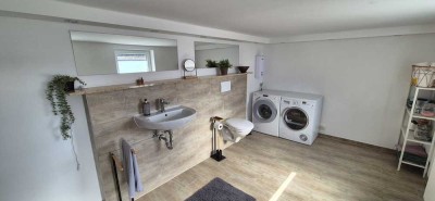 Attraktive 2-Zimmer-Erdgeschosswohnung mit gehobener Innenausstattung mit Balkon und EBK in Windeck