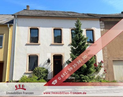 Wohnen mit Wohlfühlambiente – charmantes Haus mit versteckter Gartenidylle & Garage in Konz-Könen