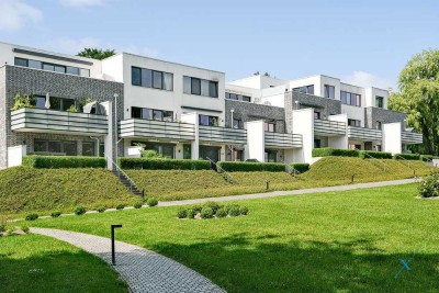 Exklusive Dachgeschosswohnung in parkähnlicher Wohnanlage mit Fördeblick