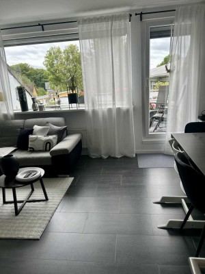 Modernisierte 3-Raum-Wohnung mit Balkon und Einbauküche in Burscheid