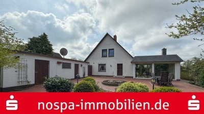 Top gepflegt! Teilunterkellertes Einfamilienhaus mit Wintergarten, Garage und Terrasse!