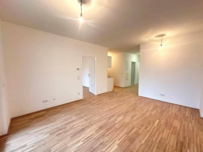 Neubauprojekt Leithastraße - Moderne 3-Zimmer-Wohnung mit großzügigem Garten