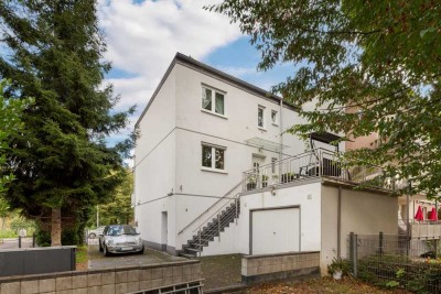 Attraktives Wohnen und Vermieten – Maisonettewohnung mit Ladenlokal in Köln-Vingst