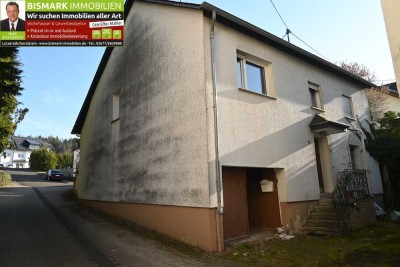 Einfamilienhaus mit Garten und Garage