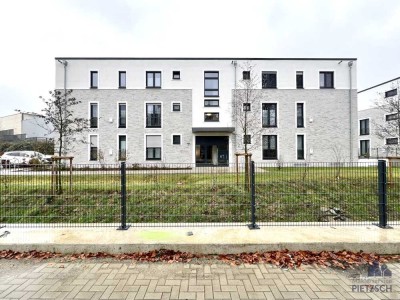 Neubau-Erdgeschosswohnung mit Tiefgaragenstellplatz mitten in Marl-Hüls!