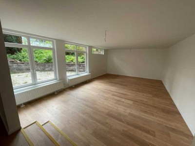 Wunderschön renovierte 2 Zimmerwohnung mit großer Terrasse nach Süden!