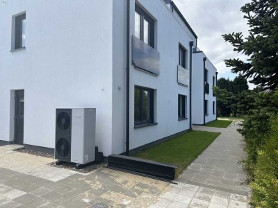 Erstbezug - Komfortable Neubauwohnung mit Terrasse, Gartenteil und barrierearmem Zugang zur Südseite