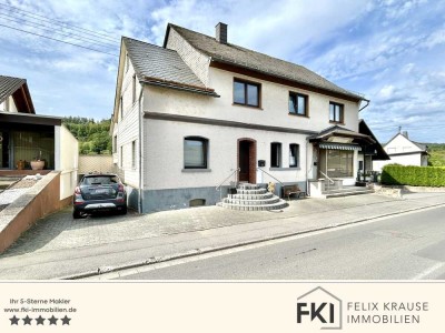 **Geräumiges Wohnhaus mit großzügiger Gewerbefläche in Atzelgift**