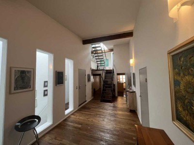 Mitten in der City – Stilvolle Loftwohnung mit Dachterrasse und Weitblick!