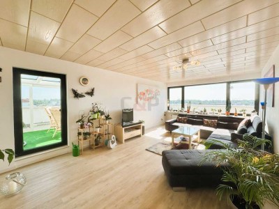 Stilvoll modernisiertes Penthouse mit XXL-Dachterrasse und Fernblick