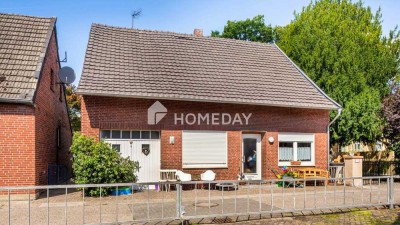Charmantes Zweifamilienhaus mit historischem Flair und solider Rendite in zentraler Lage